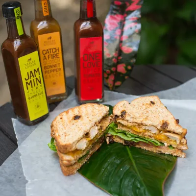 A chicken & cheese sandwich at the One Love Cafe