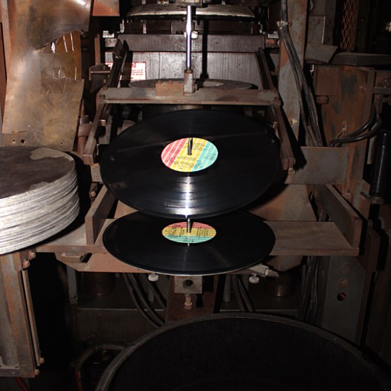 A machine making vinyl records at Tuff Gong