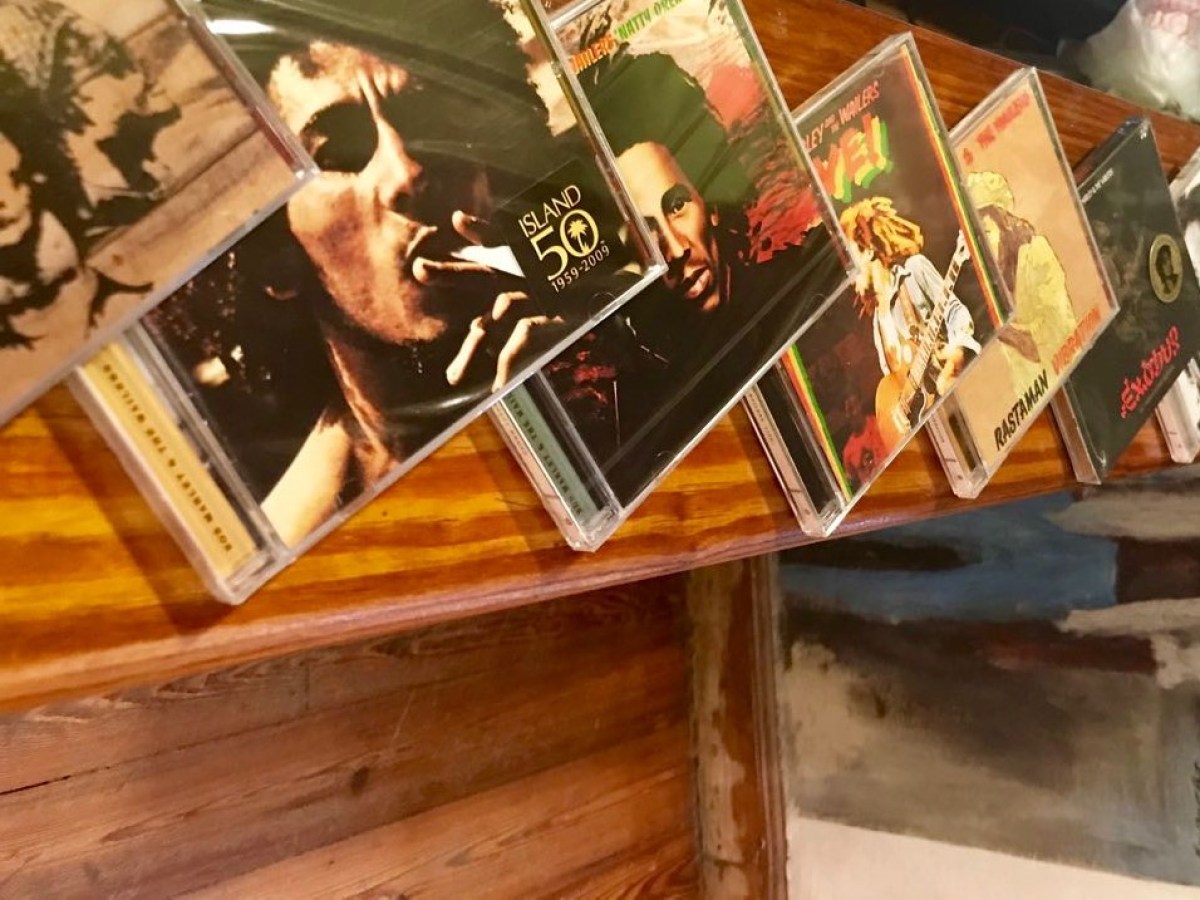 A selection of Bob Marley CDs on the table