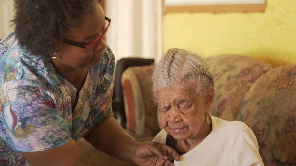 An elderly lady receiving care
