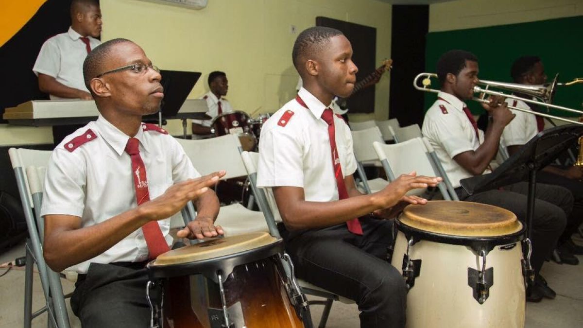 Two young men playing the drums