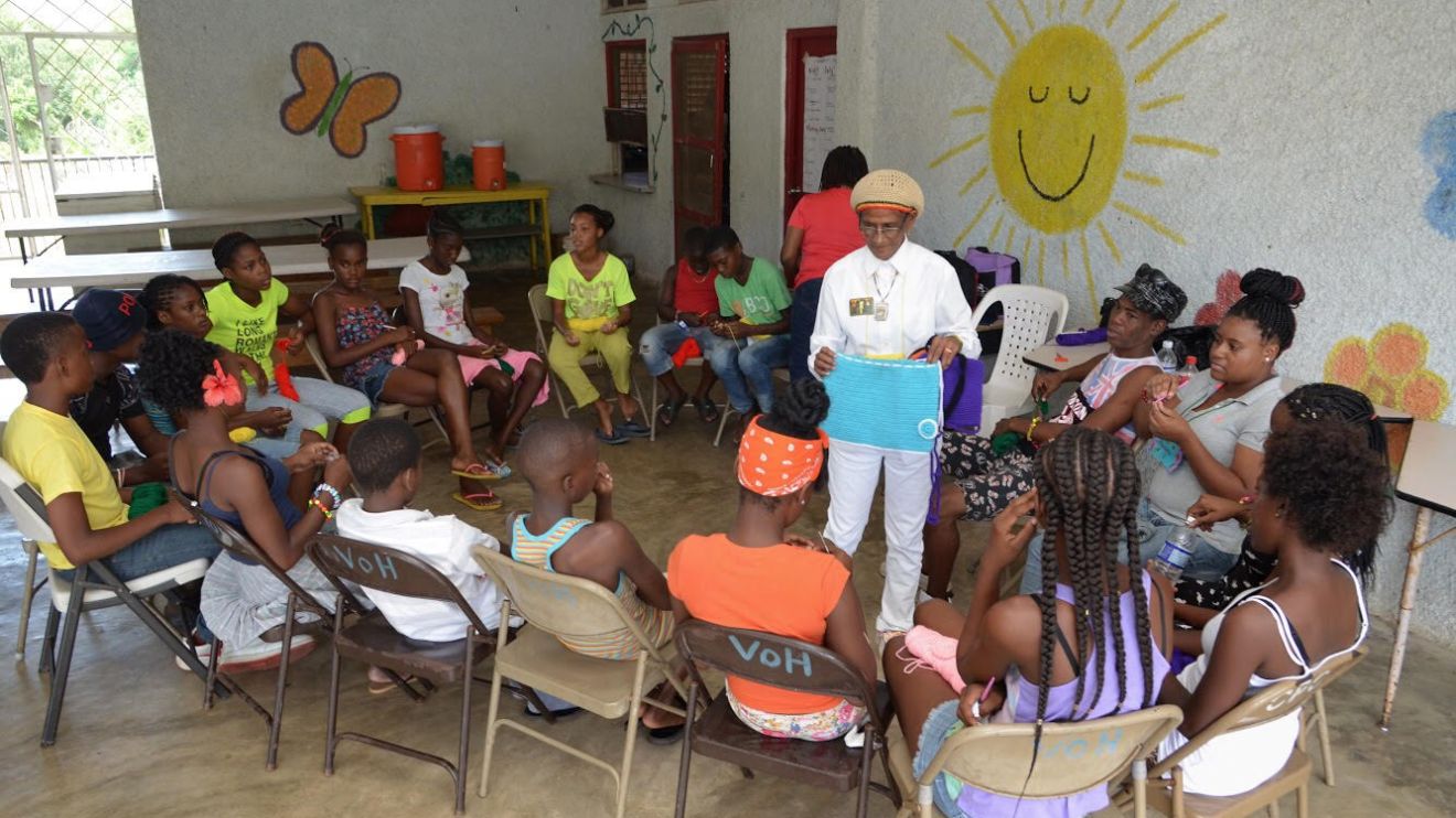A group of children receiving a lesson